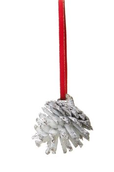 silver pine cones with red ribbon hanging, isolated with white background 