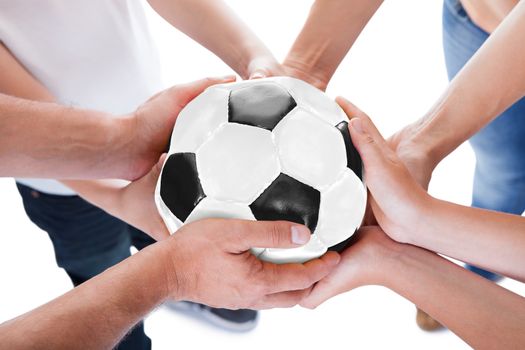 Several Hands Holding Together Soccer Ball Isolated On White Background