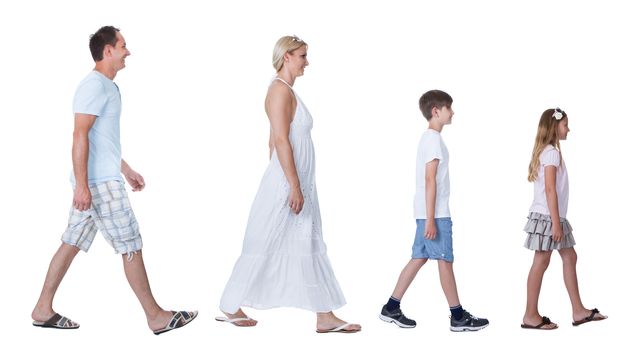 A Happy Family With Two Children Walking In A Line Isolated On White Background