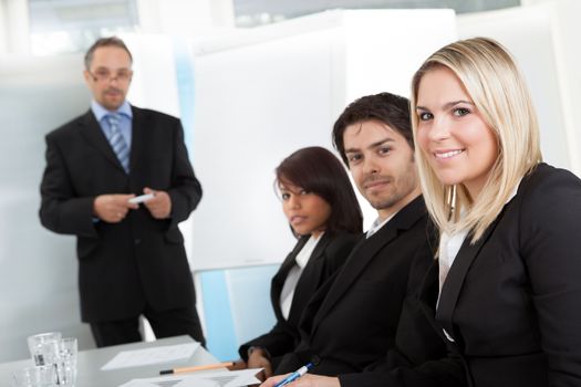 Group of business people at presentation in the office