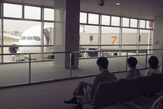 waiting hall in airport with view to the airplane