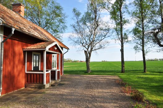 Red cottage in scenic sweden.