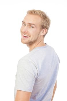 portrait of a young man with blond hair smiling - isolated on white