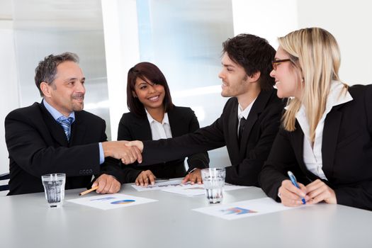 Group of business people at the meeting discussing