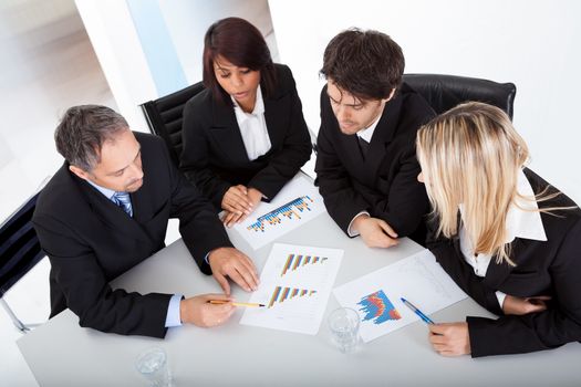 Group of business people at the meeting discussing