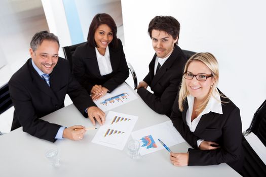 Group of business people at the meeting discussing