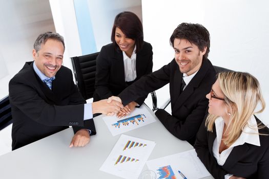 Group of business people at the meeting discussing