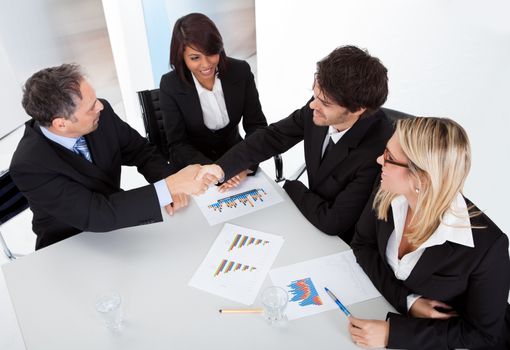 Group of business people at the meeting discussing