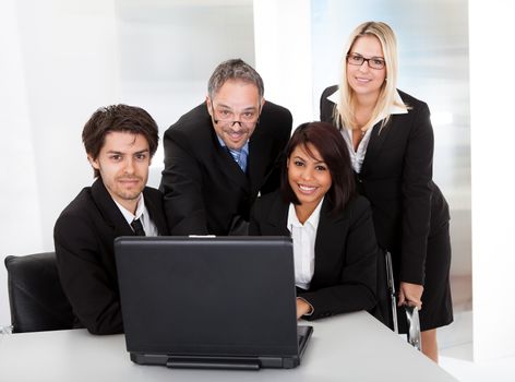 Group of business people at the meeting discussing