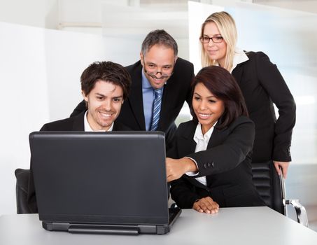 Group of business people at the meeting discussing