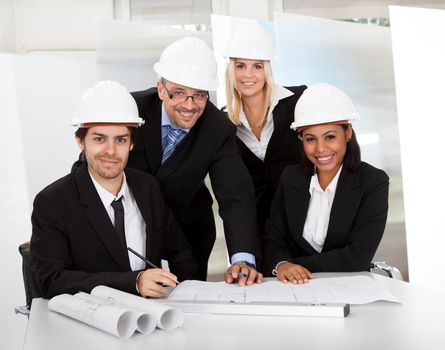 Group of architects at the meeting discussing the project