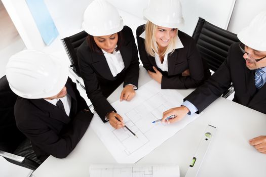 Group of architects at the meeting discussing the project