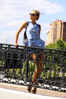Portrait of the girl to the utmost against street