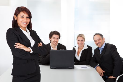 Portrait successful business woman and her team