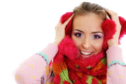 portrait of a beautiful happy woman in a knitted jacket