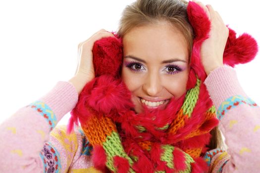 portrait of a beautiful happy woman in a knitted jacket