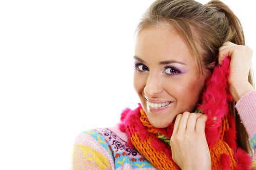 portrait of a beautiful happy woman in a knitted jacket