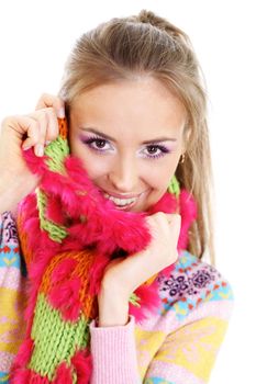 portrait of a beautiful happy woman in a knitted jacket