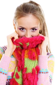 portrait of a beautiful happy woman in a knitted jacket