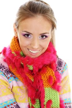 portrait of a beautiful happy woman in a knitted jacket