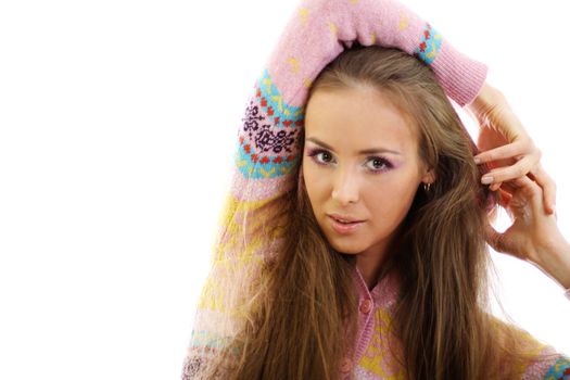 portrait of a beautiful happy woman in a knitted jacket