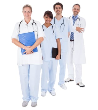 Group of doctors standing together isolated over white background