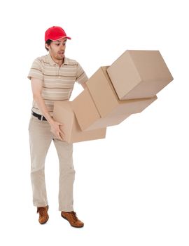 Delivery man with falling stack of boxes. Isolated on white