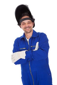 Portrait of confident welder in the mask. Isolated on white