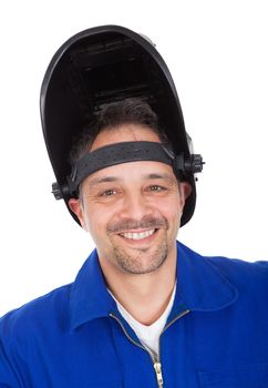 Portrait of confident welder in the mask. Isolated on white