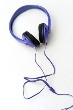 Head phones isolated on a plain bench