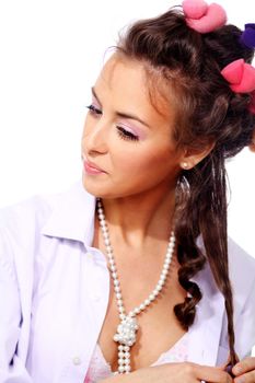 Beautiful young woman in gray background