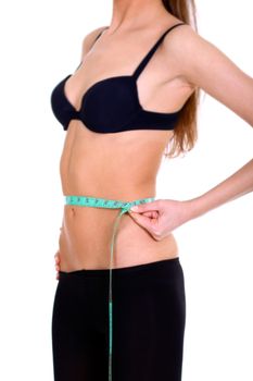 Fitness young woman in white isolated