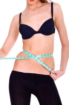 Fitness young woman in white isolated