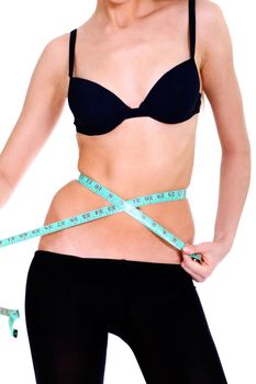 Fitness young woman in white isolated