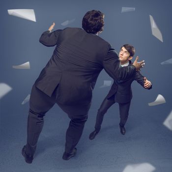 two businessmen fighting as sumoists, the concept of competition in business