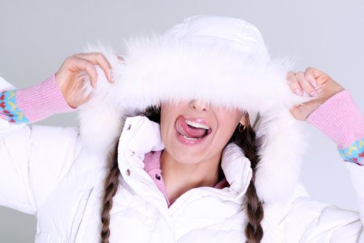 portrait of a beautiful happy woman in a knitted jacket