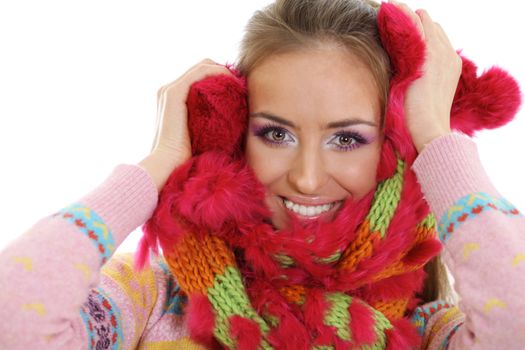 portrait of a beautiful happy woman in a knitted jacket