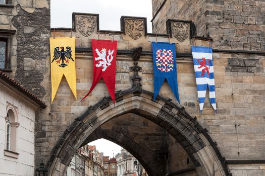 Medieval flags of Old Town bridge tower, Charles bridge, Prague,,