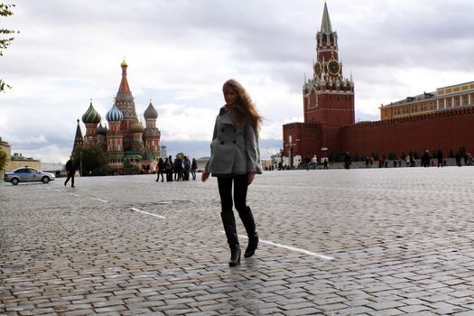 Beautiful young woman next in Red Square, Moscow