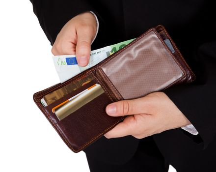 Man making a cash payment removing a banknote from his wallet