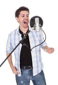 Young singer and microphone. Isolated on white