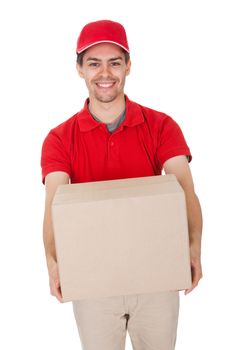 Smiling male courier in a red shirt and cap delivering a parcel in a brown cardboard box