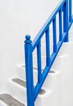 Blue handrail with white wall3