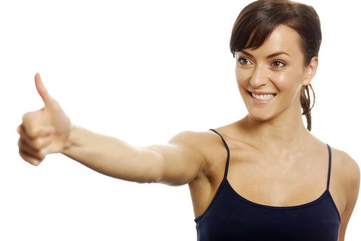 Young woman with thumb up expressing great