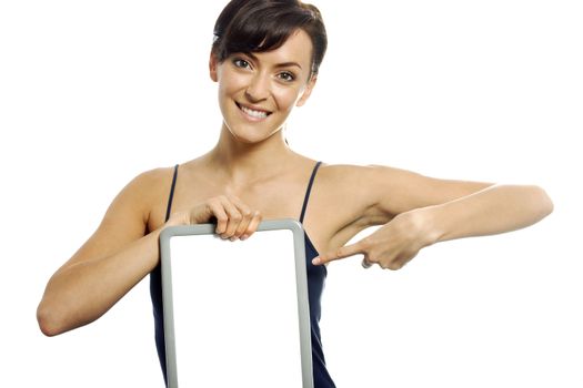 Young woman pointing to a wipe board expressing achievement.