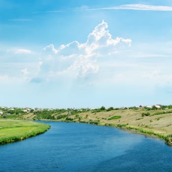 blue river under light cloudy sky