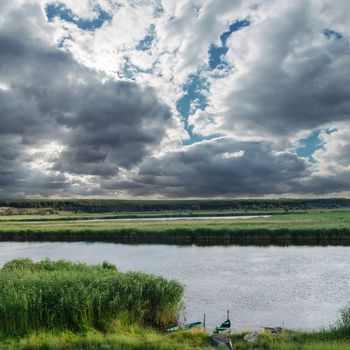 low darken clouds over river