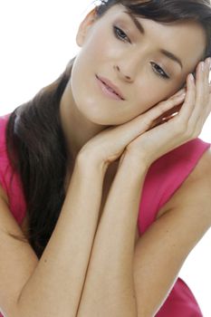 Young beautiful woman resting on her elbows smiling