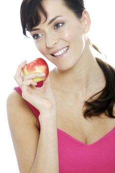 Young woman holding a fresh apple.