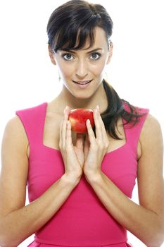 Young woman holding a fresh apple.